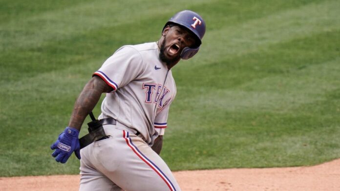 Adolis García logra récord; Rangers superan 7-6 a Angelinos