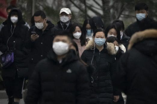 China reporta casi 60.000 decesos ligados al COVID-19