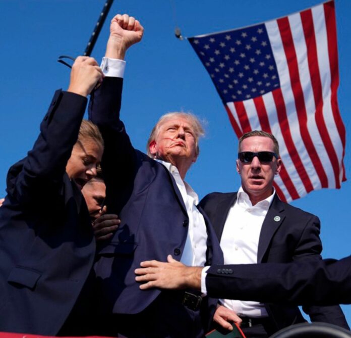 Fiscal del condado dice que dos personas murieron en el mitin de Trump, incluido el sospechoso.