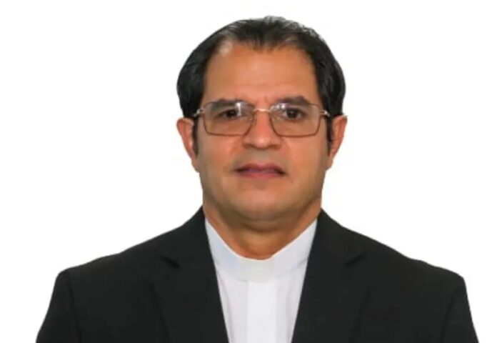 CED anuncia nombró padre Secilio Espinal como rector PUCMM