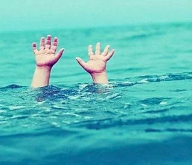 Haitiana lanza tres hijas al rio una fallecio ahogada