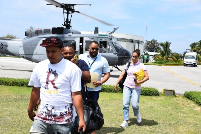 Dos menores y 9 adultos dominicanos que residían en Haití son traídos a RD tras crisis de seguridad