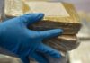 Criminalidad de uniforme. Ocupan diez paquetes de cocaína a dos policías en Santo Domingo Este